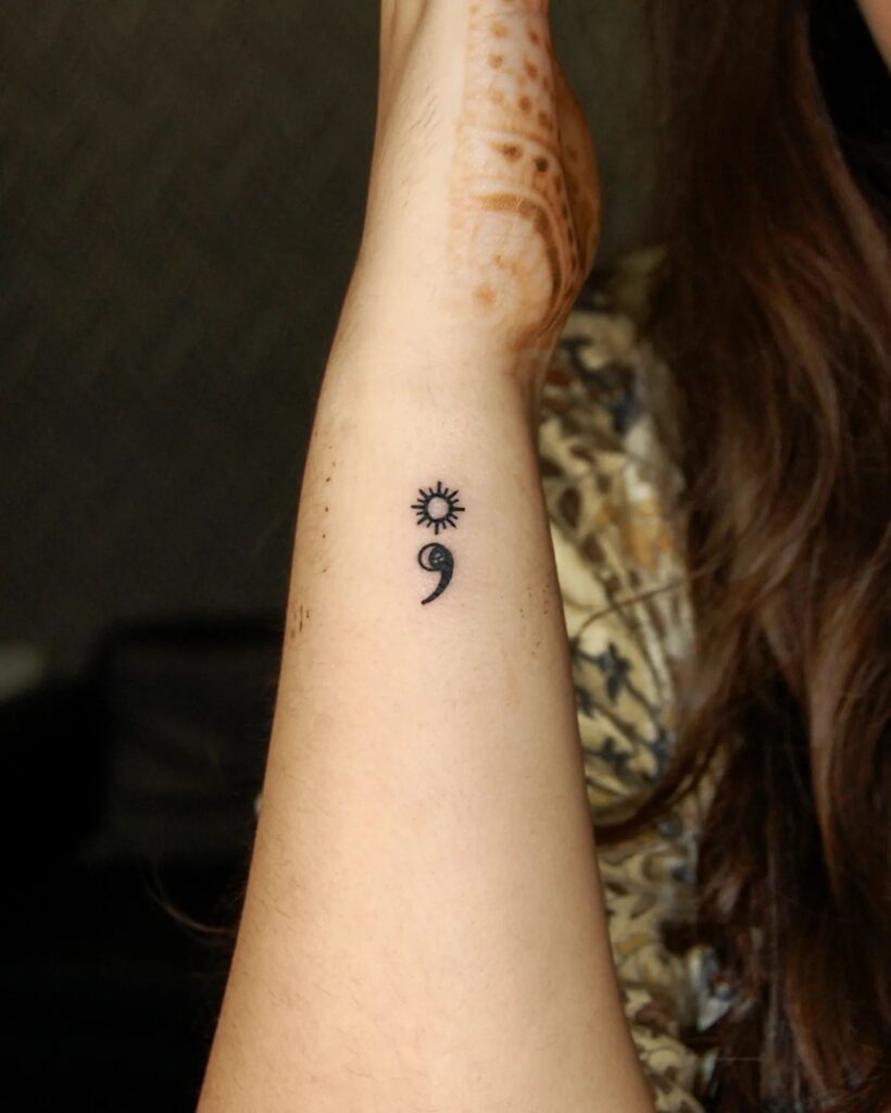 Moon and Sun Semicolon Tattoo on the Side of the Wrist: Celestial Harmony