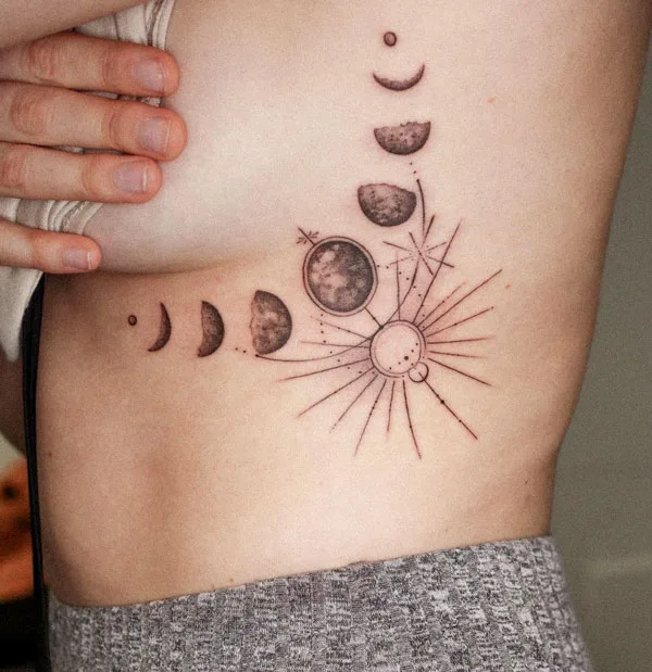 Moon side boob tattoo