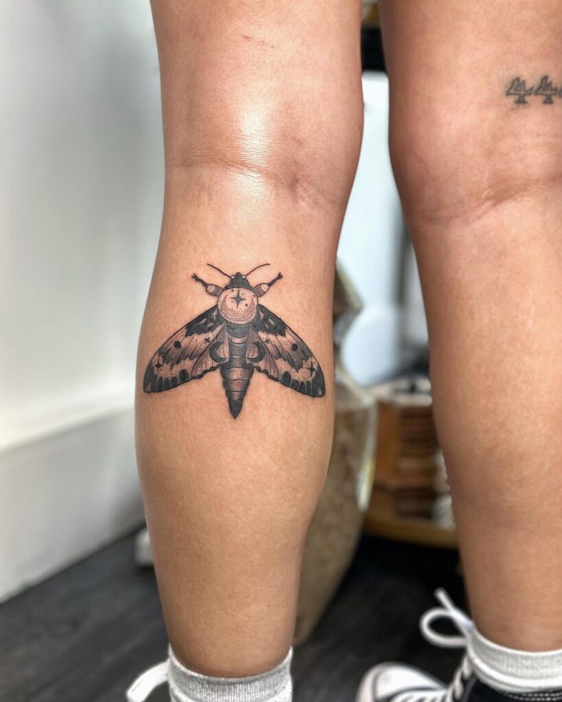 Moth Butterfly Tattoo on the Calf for a Feminine Touch: Mystic Flutter 