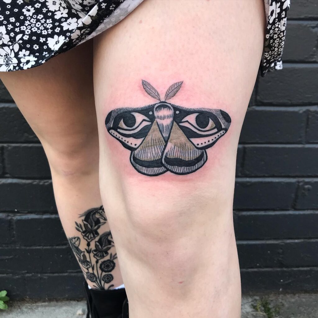 Moth magic amazing tattoo designs above the knee