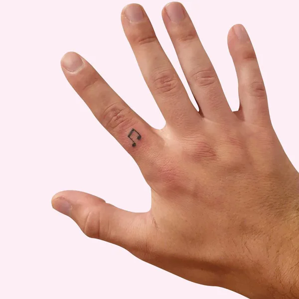 Music Note Finger Tattoo