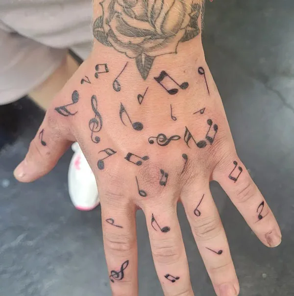 Music Note Tattoo on Hand 1