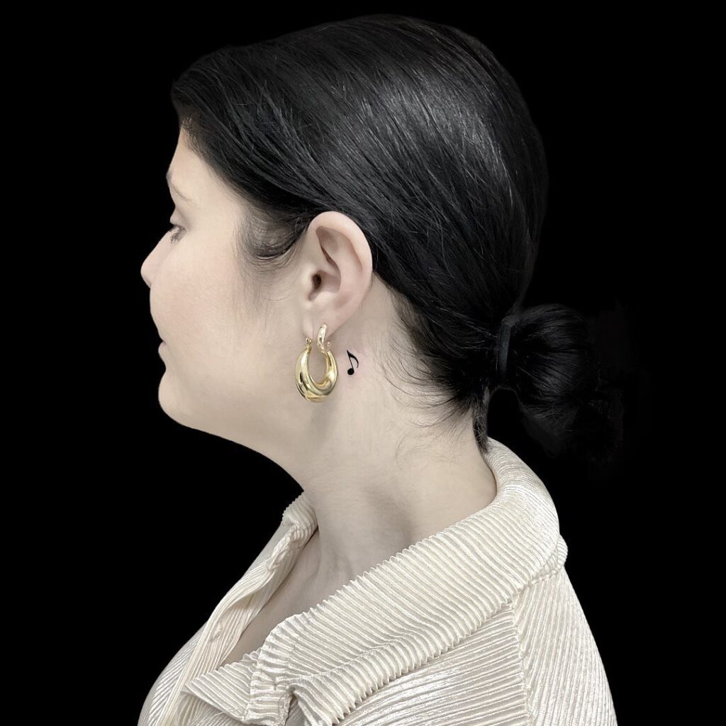 Musical Tone Tattoo Design on the Side of the Neck