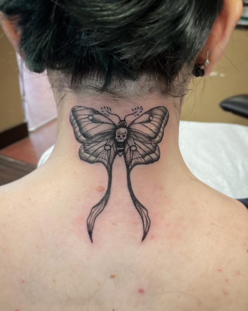 Mystical intrigue death moth tattoo gracefully on the nape