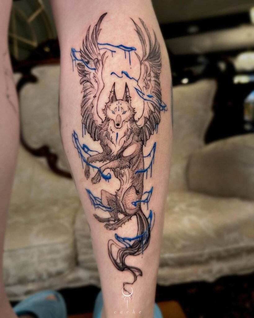 Mythical majesty unleashed winged watery wolf calf tattoo