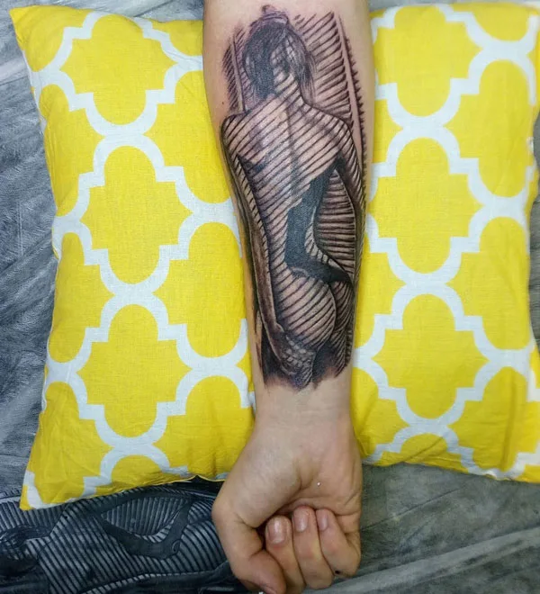 Naked women forearm tattoo
