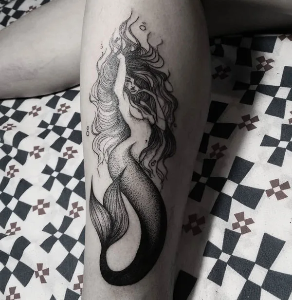 Naked women mermaid tattoo