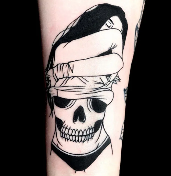 Naked women skull tattoo