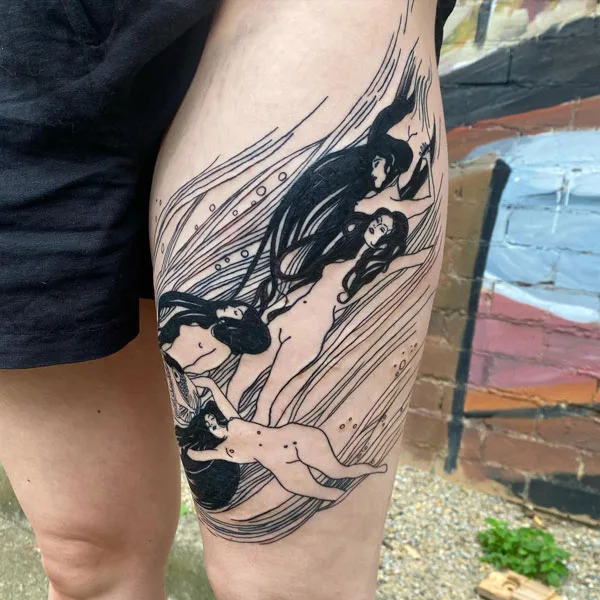 Naked women thigh tattoo