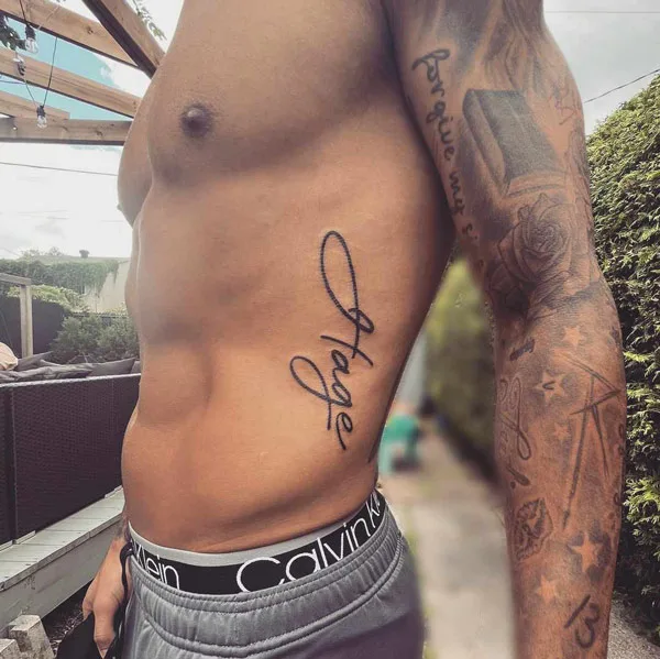 Name Rib Tattoo