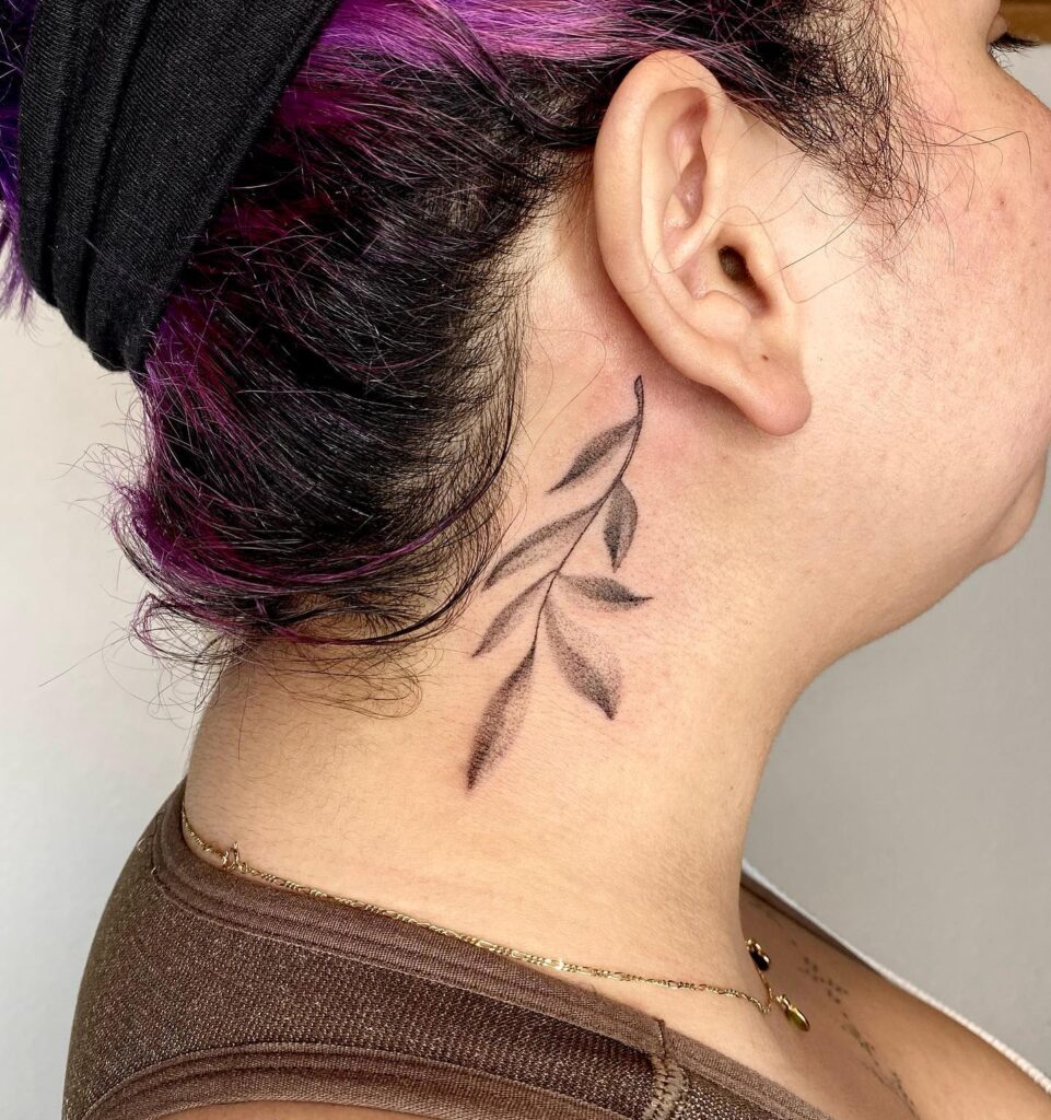 Natures serenity simple leaf tattoo as a subtle neck accent