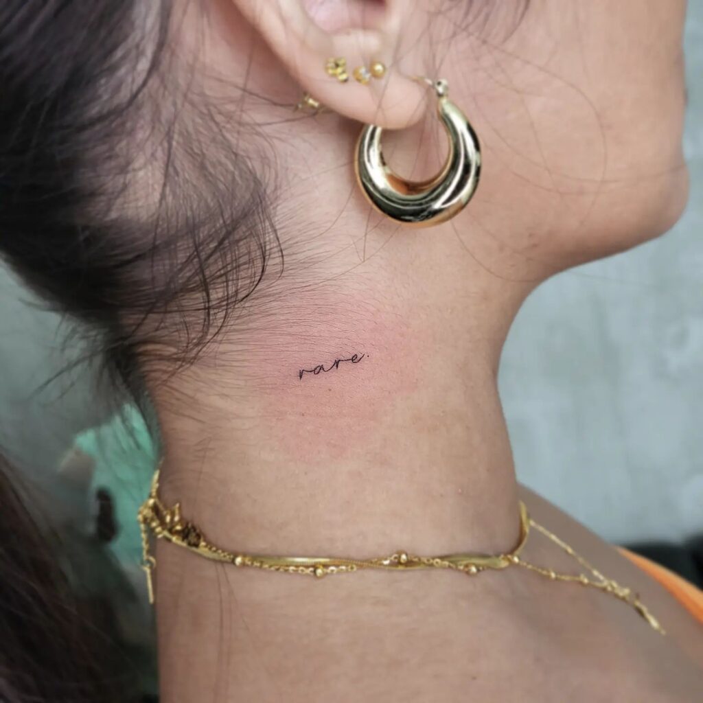 Neck Word Lettering Tattoo, a Minimalist Black Ink Classic: 'Rare' Gem