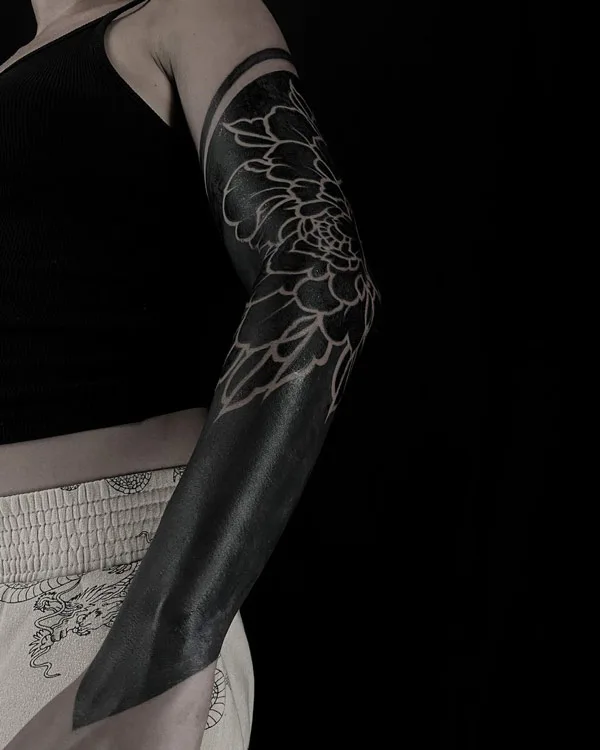 Negative Space Blackout Tattoo