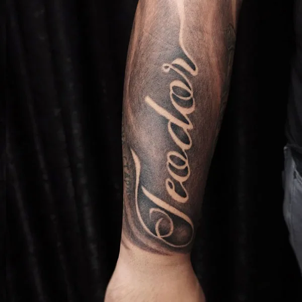 Negative Space Lettering Tattoo 2