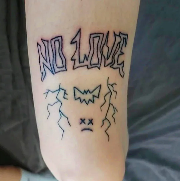 No love above the knee tattoo