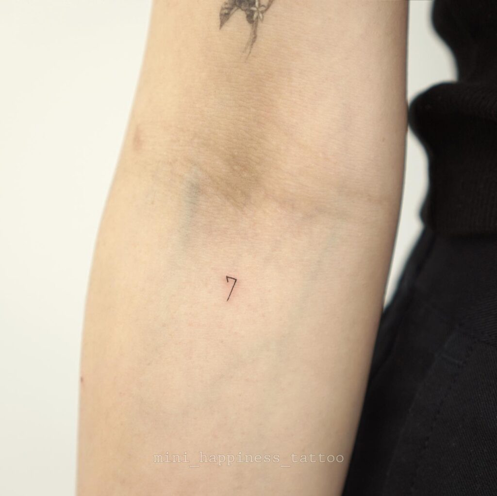 Number '7' Below the Elbow, a Small and Simple Tattoo: Lucky Seven