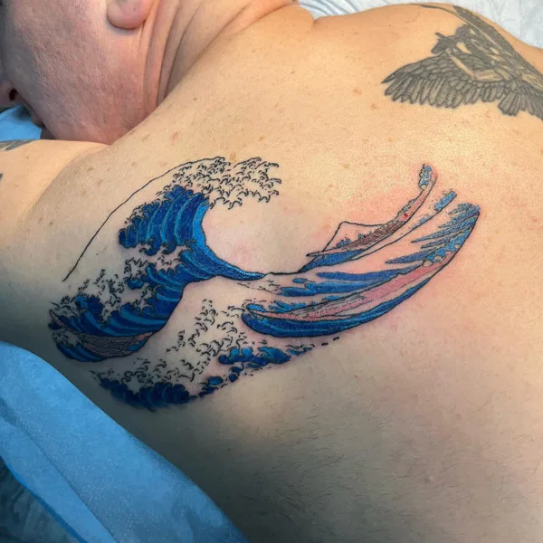 Ocean wave tattoo 12