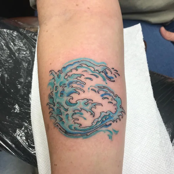 Ocean wave tattoo 36