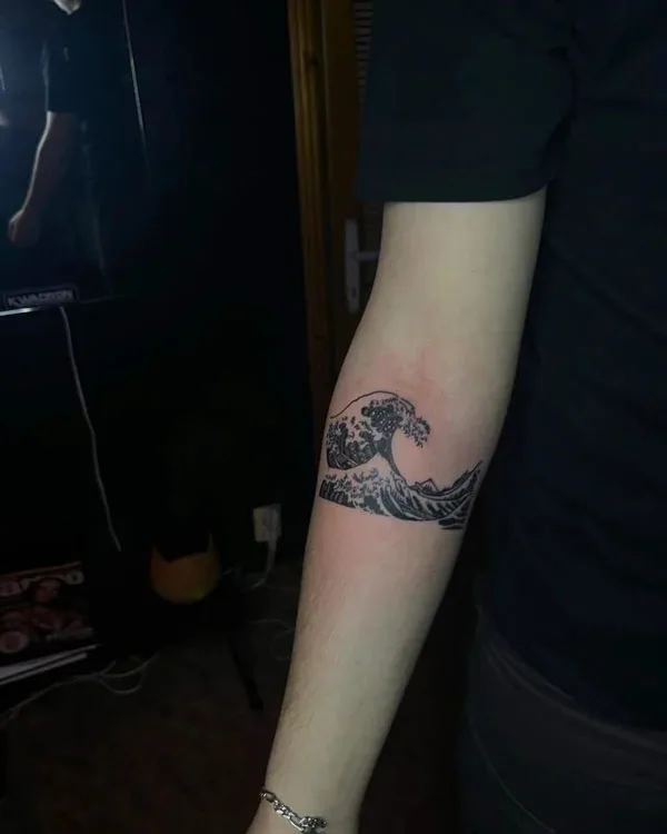 Ocean wave tattoo 40