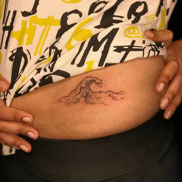 Ocean wave tattoo 6