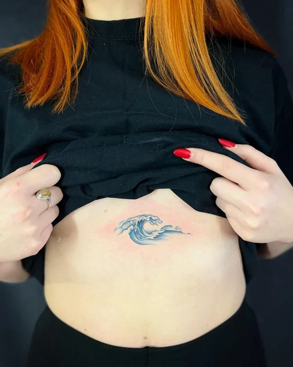 Ocean wave tattoo 9