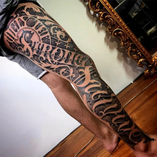 Only the strong survive tattoo on leg