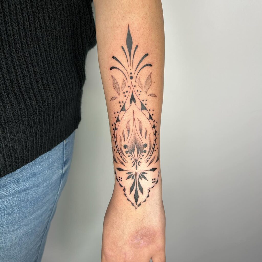 Ornamental finesse forearm fineline tattoo design