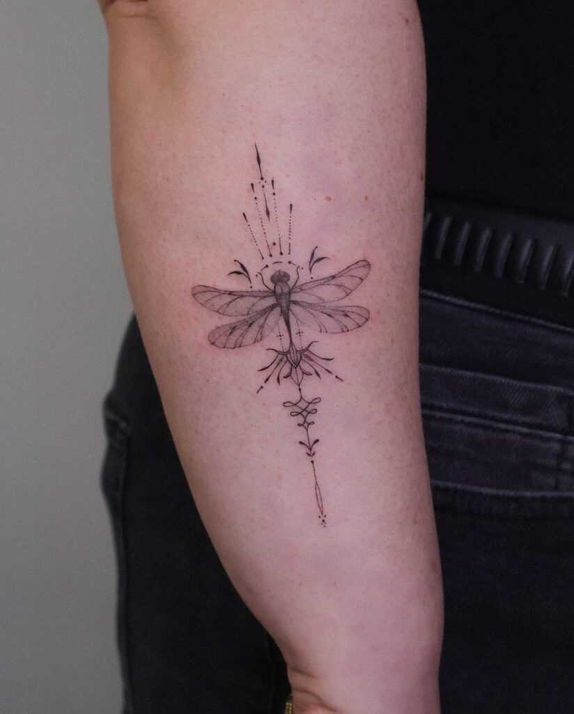 Ornamental Realism Dragonfly Tattoo with Mystical Elements