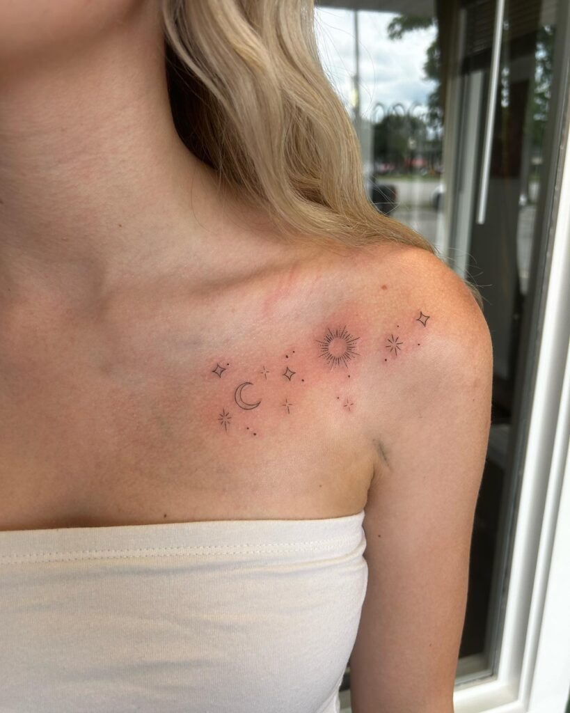 Ornate universe fineline ornamental star shoulder tattoo