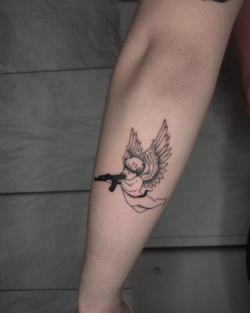 Outer forearm angel with gun tattoo ideas below the elbow brilliance