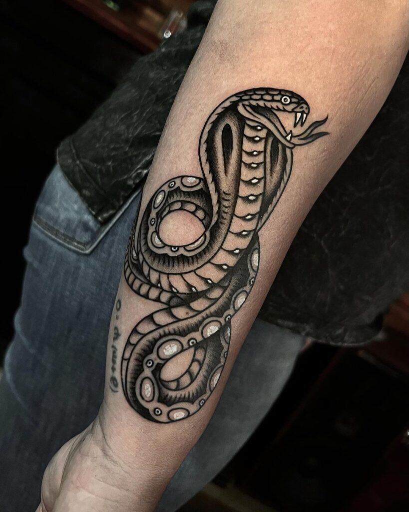 Outer forearm angry king cobra tattoo old school blackwork beauty