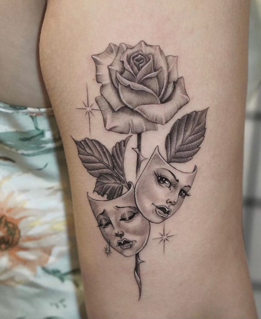 Outer shoulder arm laugh now cry later tattoo with rose artful and expressive 