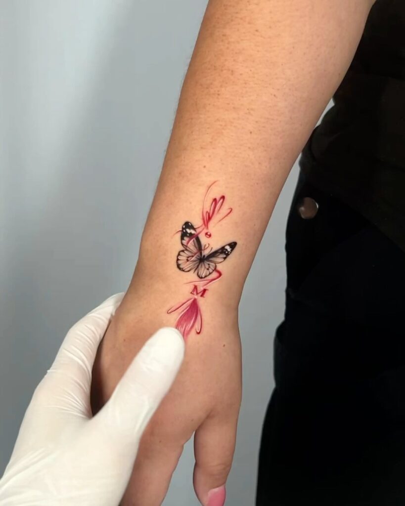 Outer wrist butterfly norigae with precious initials 'M'