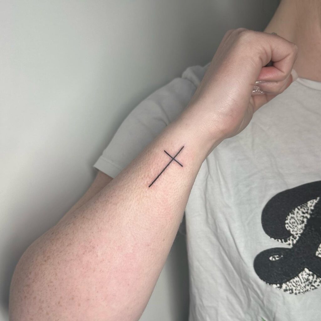 Outer wrist charm small cross tattoo for girls