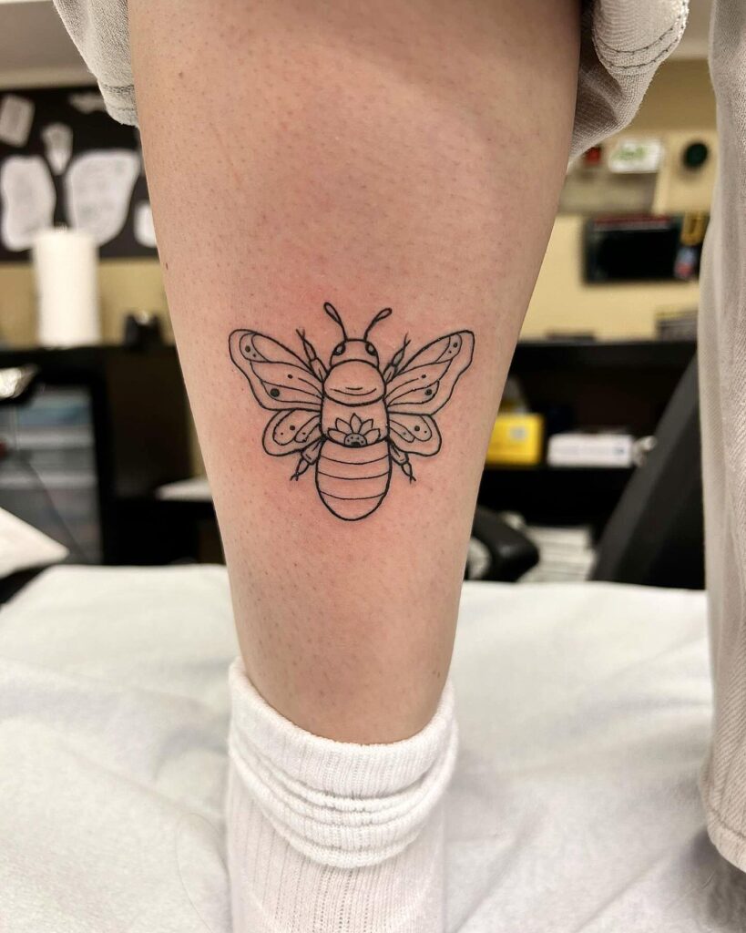 Outline Beautiful Bee Tattoo on the Calf for Subtle Charm: Graceful Flight 