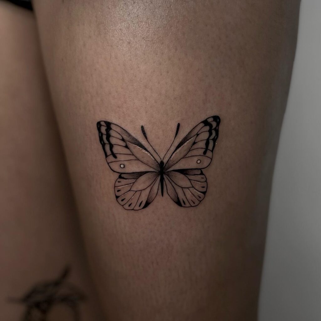 Outline butterfly tattoos simple and stylish on your thigh
