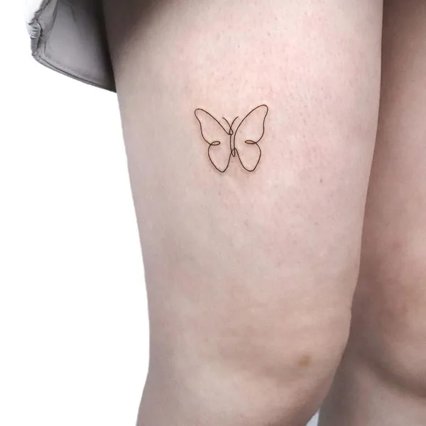 Outline butterfly thigh tattoo
