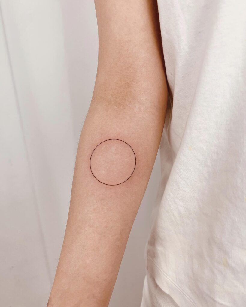 Outline Circle Tattoo for Subtle Sophistication on the Forearm: Perfect Simplicity