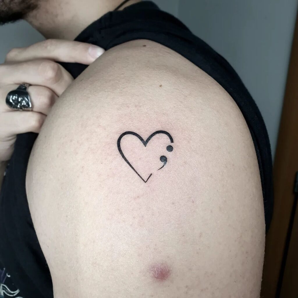 Outline Heart Completed with Semicolon Tattoo on the Upper Arm: Heartfelt Design