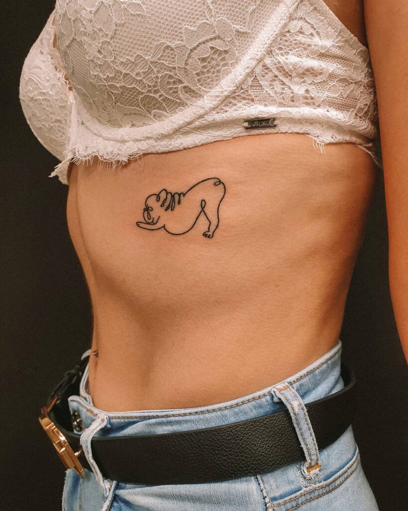 Outline Minimalistic French Bulldog Tattoo on the Rib for a Stylish Statement: Chic Pup
