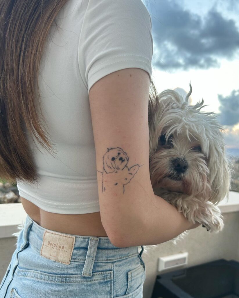 Outline Tattoo on the Back Above the Elbow: Shih Tzu Silhouette