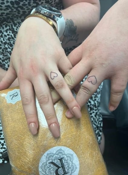 Outlined Love Heart Tattoo Ideas for Couples