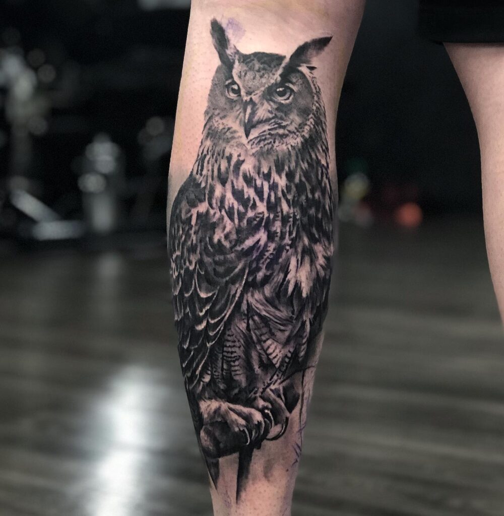 Owl Black and Grey Tattoo Perched on a Branch on the Calf: Nocturnal Majesty 