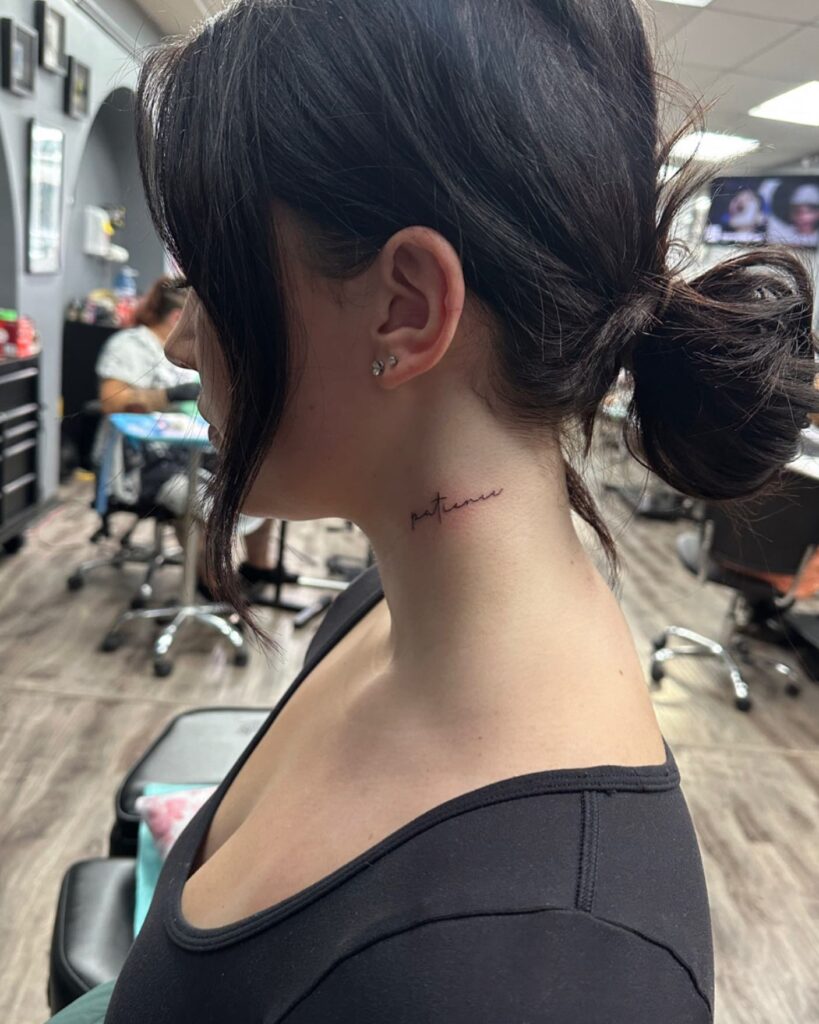 'Patience' Script on the Side of the Neck: Enduring Virtue