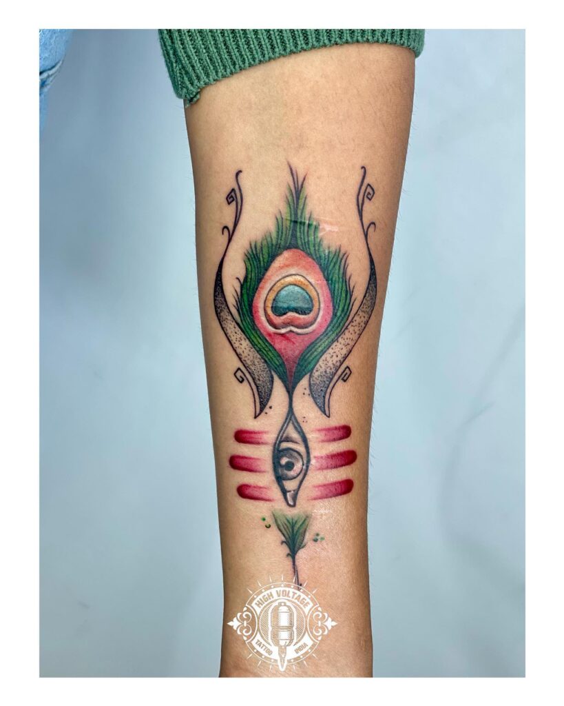 Peacock feather and shiva's third eye a lower half sleeve tattoo wonder
