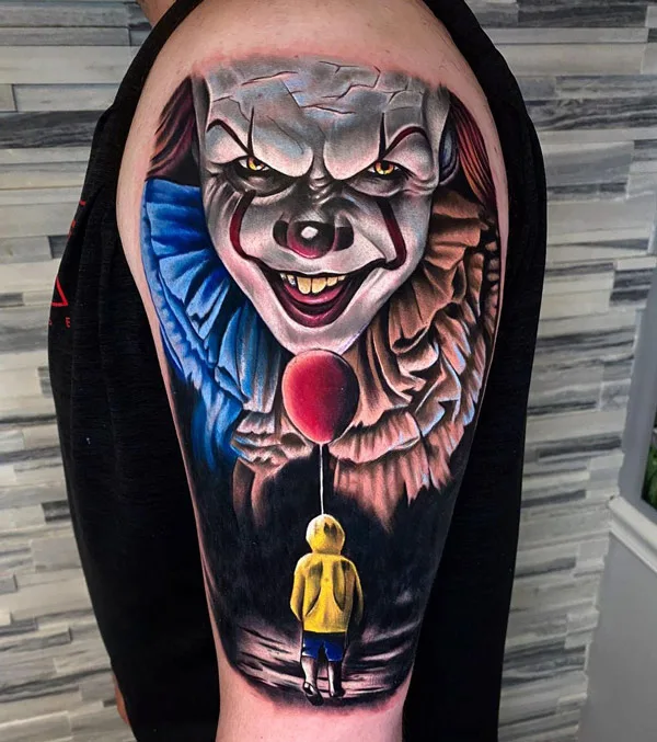 Pennywise tattoo on arm