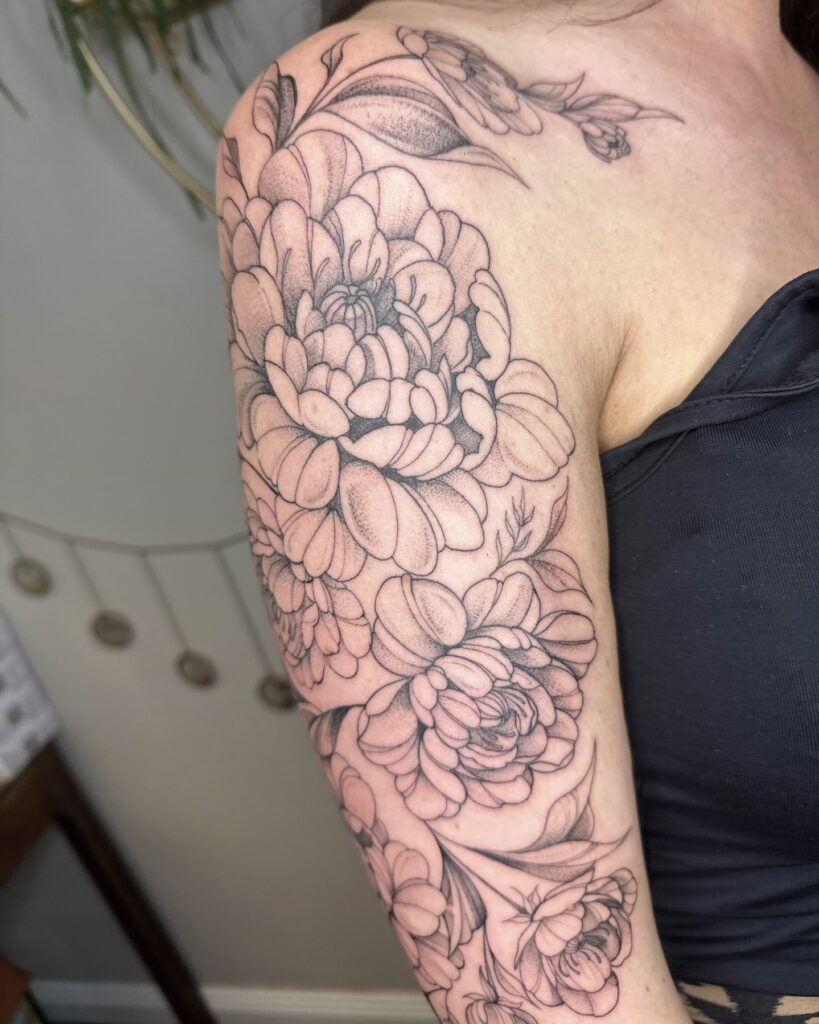 Perfect Peony Half Sleeve Tattoo for Women Exuding Elegance and Compassion