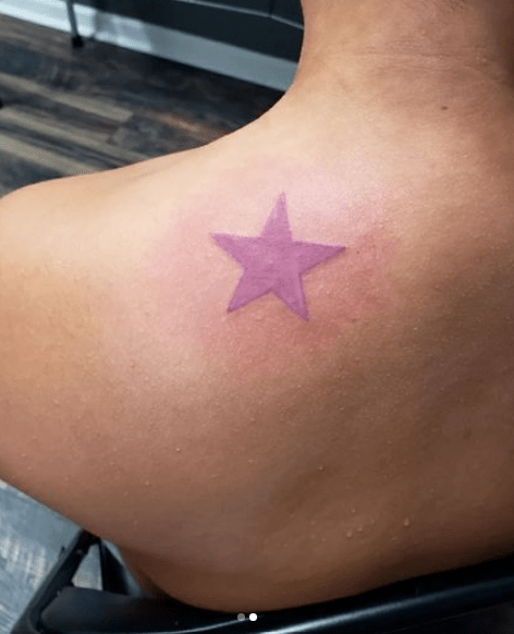 Pink Single Star Back Shoulder Tattoo Pink Single Star Back Shoulder Tattoo