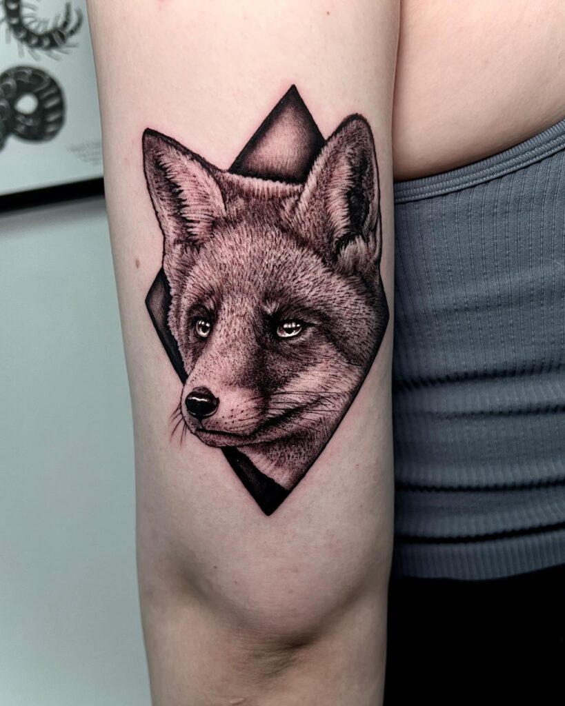 Portrait Tattoo of a Fox on the Back of the Elbow: Micro-Realistic Majesty
