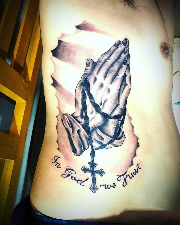 Praying Hands Rib Tattoo
